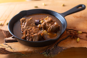 Food concept Homemade spicy meat stew in Cast-Iron Skillet pan with copy space