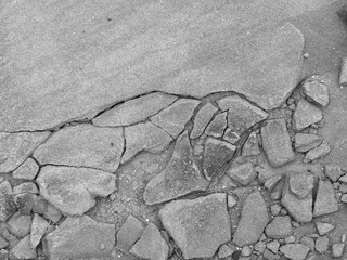 Cracked concrete floor texture closeup background