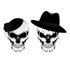 Male and female skulls in hats. Black and white vector image.