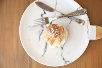 choux cream on wooden table