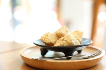 warabi mochi Japanese dessert on wooden table