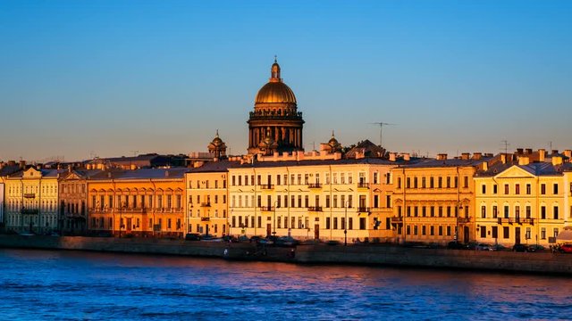 St Petersburg, Russia. Moyka river in Saint Petersburg, Russia in the evening, historical buildings, bridges and clear sunset sky. Various bars and restaurants. Time-lapse at sunset, zoom in