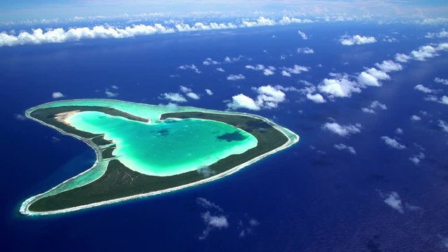 Aerial view of Coral Reef Tupai Heart Island French Polynesia 