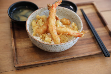 Tempura donburi , Fried shrimp tempura on rice japanese food on wooden table