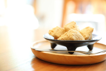 warabi mochi Japanese dessert on wooden table