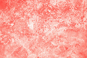 Trendy living coral color concept of the year 2019, textured limestone background