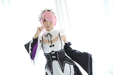 Portrait of Japan anime cosplay woman , white japanese maid in white tone room