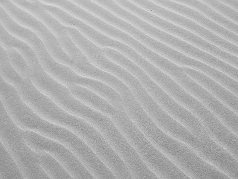 gray sand wave ripple at the beach