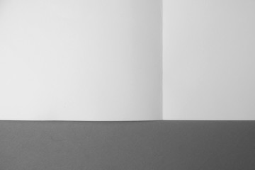 fold white paper on gray background