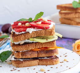French toast with cottage cheese, strawberries, kiwi and blueberries