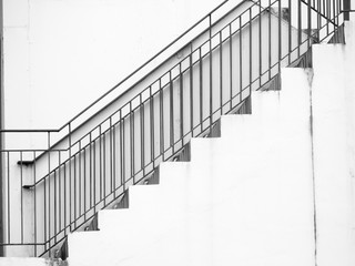 A staircase on the external wall of an urban building