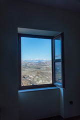 Window View in an Abandoned Ghost Town in Southern Italy