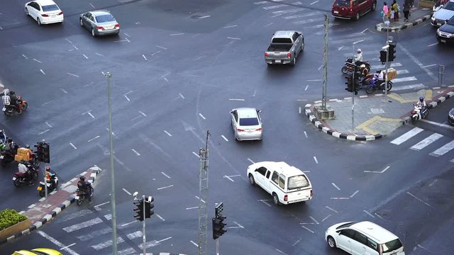 slow-motion of traffic at Hua Lamphong intersection in Bangkok, Thailand