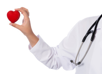 Medicine doctor holding red heart shape in hands on hospital background, medical concept