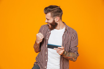 Portrait of a cheerful young man wearing casual clothes