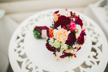 Beautiful wedding bouquet with different flowers, roses