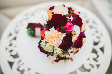 Beautiful wedding bouquet with different flowers, roses