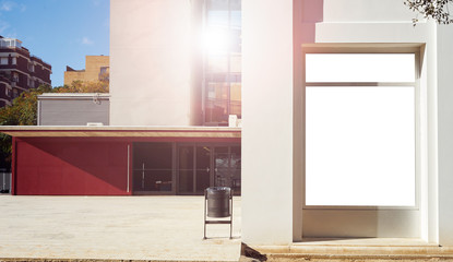 Mockup of a blank white advertising urban billboard on a building wall in a city..