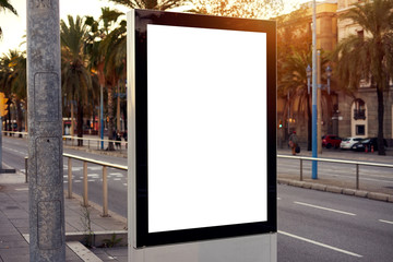 Mockup of a blank empty white advertising urban billboard, placeholder template city street, space for design layout, sunset light.