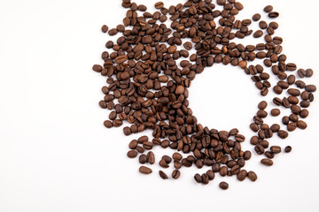 coffee beans on a white table, with copy space