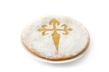Tarta de Santiago. Traditional almond cake from Santiago in Spain, isolated on white background