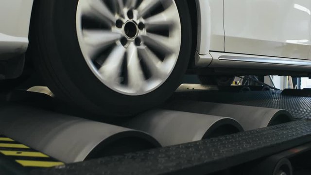 Car standing in auto service for measuring power. Testing car power in service