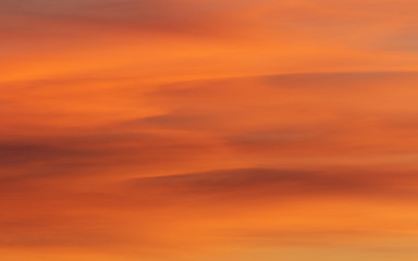 Bright colorful long clouds in sunset time. Like brush stroke.