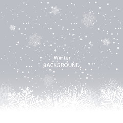 White snowflakes on gray background. winter background