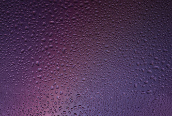 backgrounds are multicolored, water on the glass