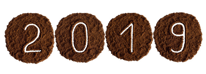 2019 decorated with ground coffee on white background