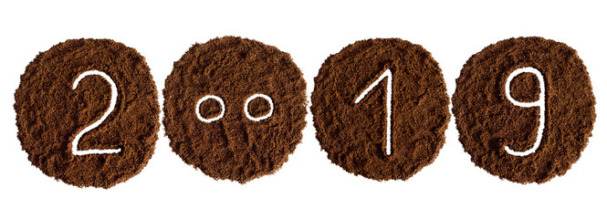 2019 decorated with ground coffee on white background