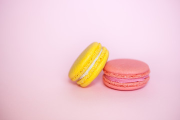 Macaroon on pink background, beautiful card with sweet food