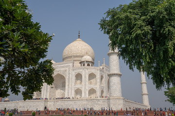 Fototapeta na wymiar The side view of the park and Taj Mahal in Agra, India in day time.