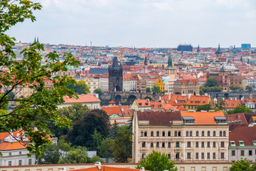 Fototapeta premium View over historic center of Prague with castle Prague city panorama, red roofs of Prague, Czech Republic