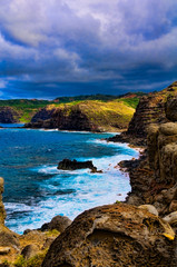 Obraz na płótnie Canvas Boulder on a cliff overlooking the ocean, Maui, Hawaii, USA