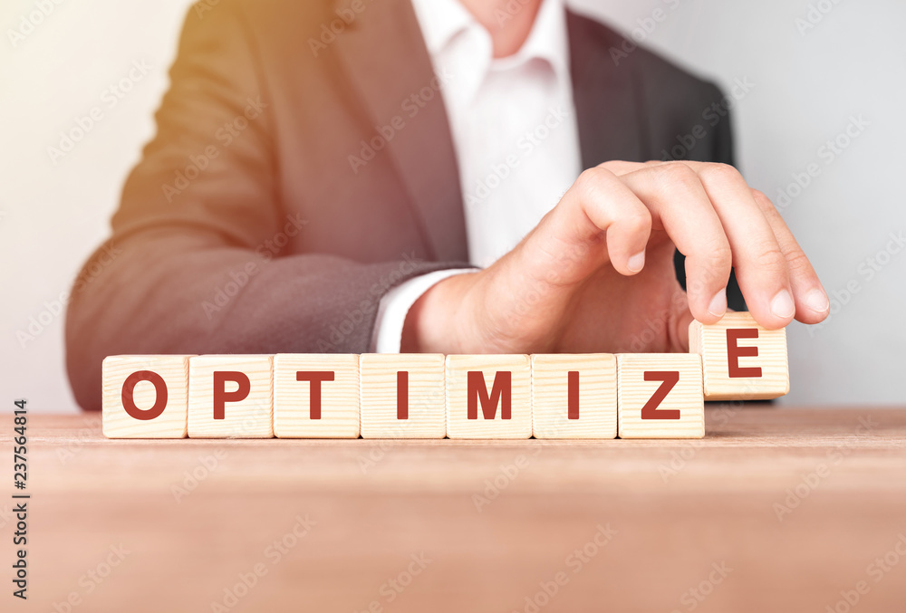Poster man made word optimize with wood blocks