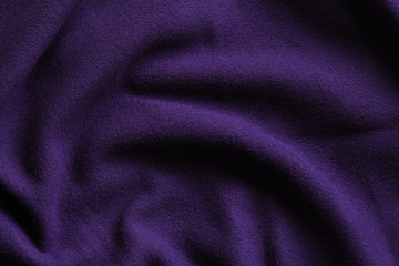 Texture of deep purple fleece © evannovostro