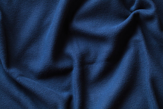 Wavy texture of blue fleece fabric