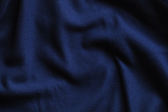 Texture of fleece, deep blue fabric