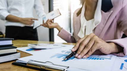 Startup business people group brainstorming on meeting to planning investment project working and strategy of business making conversation with partner, financial and accounting concept