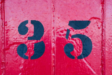 Numbers on brightly coloured wooden doors