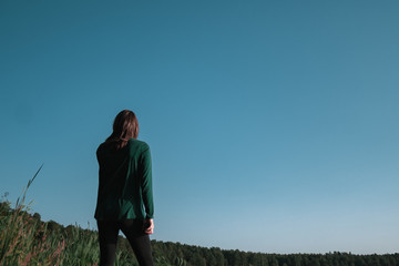 young man on top of mountain
