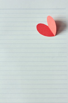 Blank Page In Notebook And Red Paper Heart