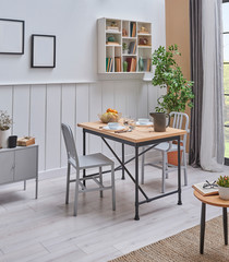Home dining room table, wooden table shelf and chair concept, vertical corner of saloon.