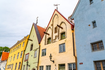 Fototapeta na wymiar Tallinn in Estonia, colorful houses in the medieval city, typical buildings 