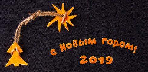 Christmas decorations hand made from tangerine peel, printed layout of the postcard, russian text