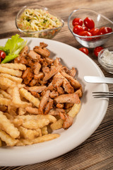 Greek gyros dis with fries and salad