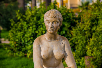Fototapeta na wymiar Female statue around the beach area of Sitges in Barcelona, Spain