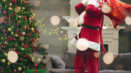 After putting presents in bag Santa Claus going to
