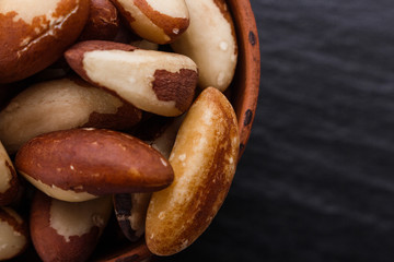 brazil nut on a dark stone background